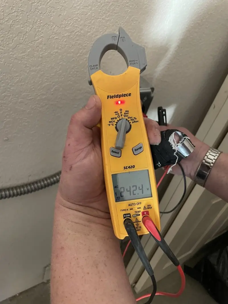 Voltage testing with clamp meter during Electrical Installation Services in Liberty Lake